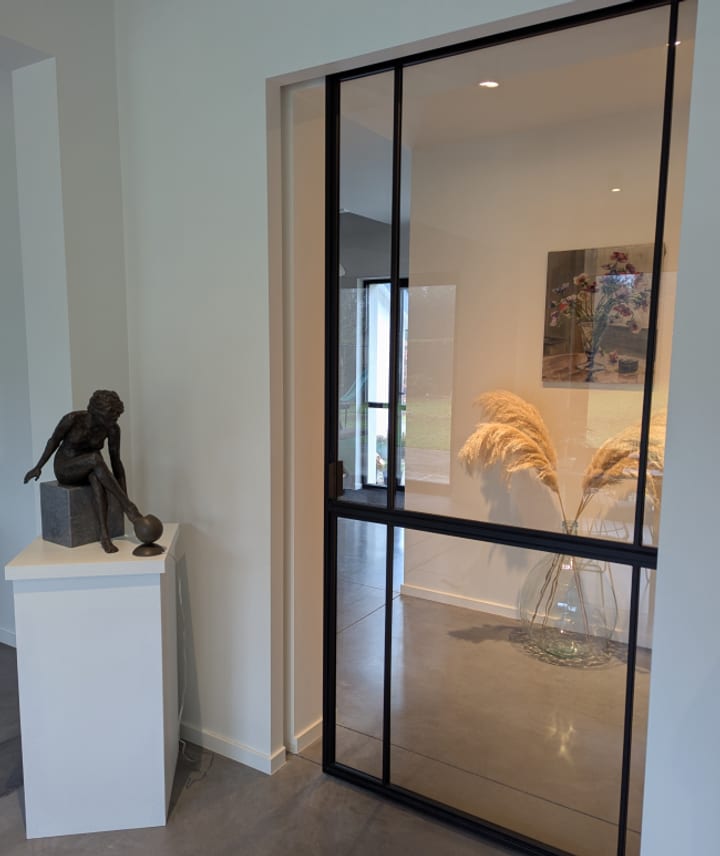 Porte coulissante sur mesure en acier thermolaqué